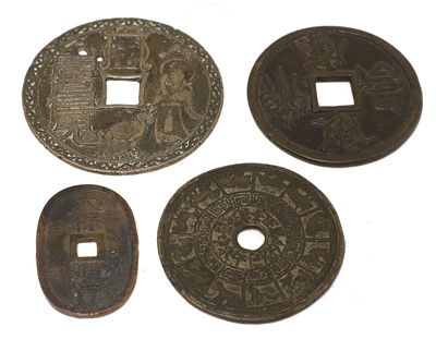Lot 250 - A collection of four Chinese metal coins