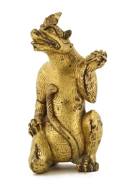 Lot 120 - A Chinese gilt-bronze figure