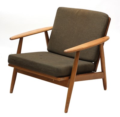 Lot 474 - A teak armchair