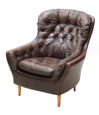 Lot 491 - A Danish leather button back armchair