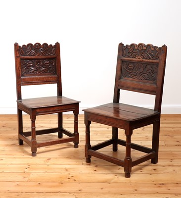 Lot 412 - A pair of Charles II oak backstools