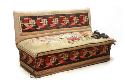 Lot 394 - A Victorian needlepoint settle