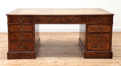 Lot 417 - A large Victorian walnut partners' desk