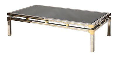 Lot 557 - A chrome and brass coffee table