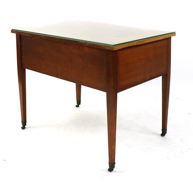 Lot 570 - A Regency style satinwood writing table