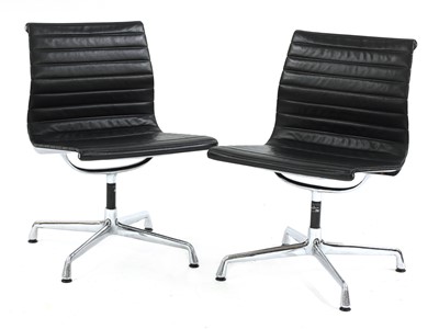 Lot 361 - A pair of Eames 'EA105' chairs
