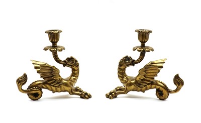 Lot 44 - A pair of brass candlesticks