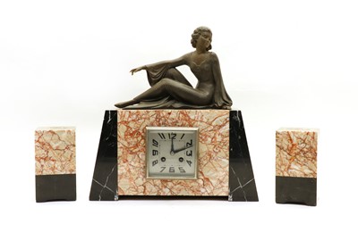 Lot 489 - An Art Deco marble and spelter clock garniture