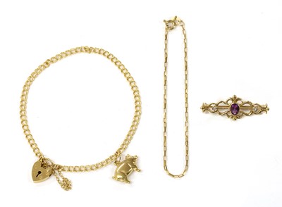 Lot 234 - A gold charm bracelet