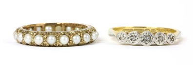 Lot 235 - A gold five stone diamond ring