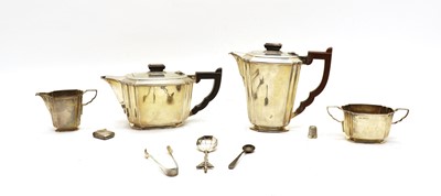 Lot 1 - An Art Deco style silver four piece service