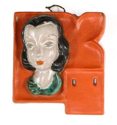 Lot 214 - A small Goldscheider pottery wall mask calendar