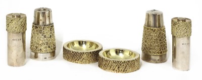 Lot 328 - A matched silver-gilt condiment set