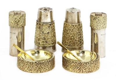 Lot 328 - A matched silver-gilt condiment set