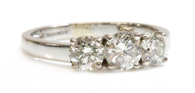 Lot 428 - An 18ct gold three stone diamond ring