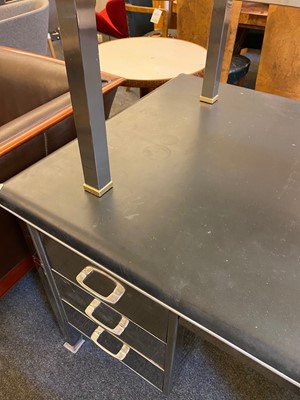 Lot 153 - A polished steel desk