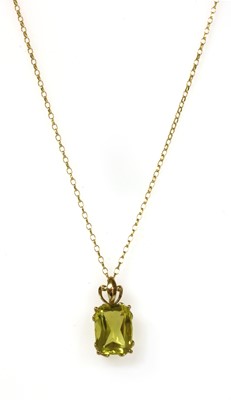 Lot 185 - A 9ct gold single stone citrine pendant