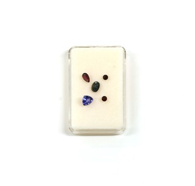 Lot 180 - An unmounted triangular mixed cut tanzanite