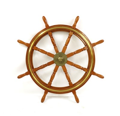 Lot 256 - A large oak and brass ship's wheel