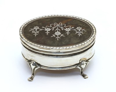 Lot 9 - An Edwardian silver tortoiseshell trinket box