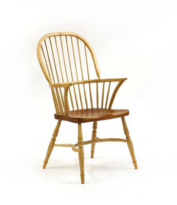 Lot 540 - A modern yew and ash high hoop back Windsor chair