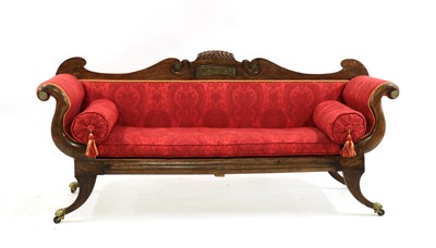 Lot 411 - A Regency faux rosewood settee
