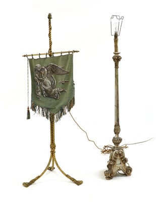 Lot 547 - A carved and silvered standard lamp