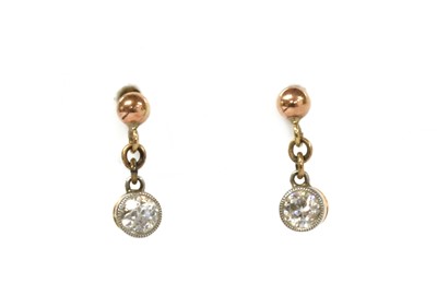 Lot 11 - A pair of Edwardian gold diamond drop earrings