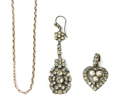 Lot 22 - A silver paste and imitation pearl heart shaped pendant