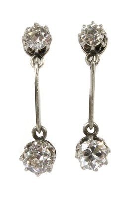 Lot 12 - A pair of early 20th century diamond drop earrings