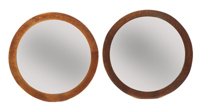 Lot 84 - A pair of Arts and Crafts circular oak wall mirrors