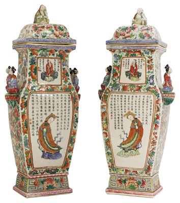 Lot 37 - A pair of Chinese famille rose vases and covers