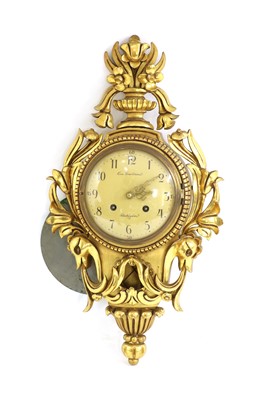 Lot 326 - A Swedish carved wood and gilt cartel wall clock
