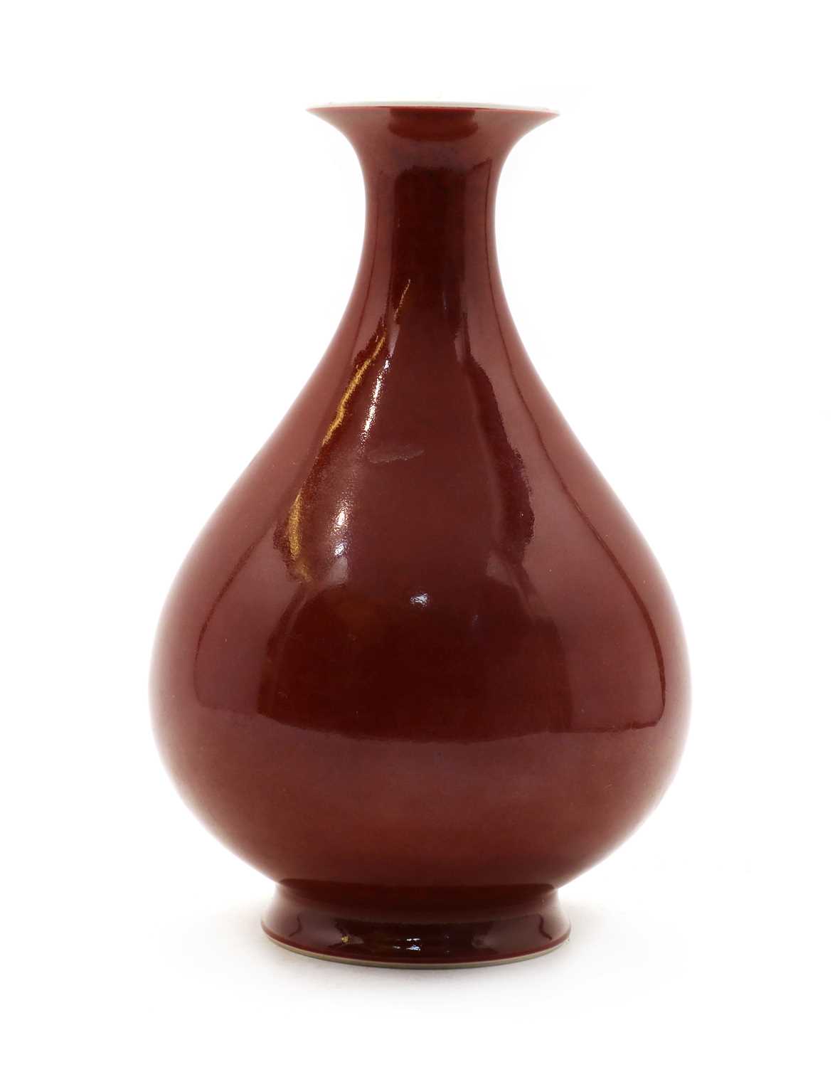 Lot 237 - A Chinese copper-red glazed 'yuhuchun' vase