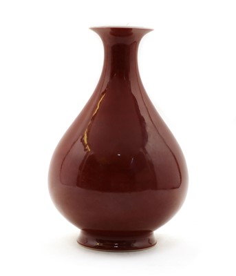 Lot 237 - A Chinese copper-red glazed 'yuhuchun' vase
