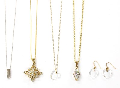 Lot 233 - A gold single stone cubic zirconia pendant