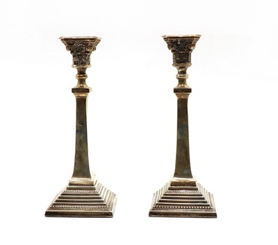 Lot 36 - A pair of silver candlesticks