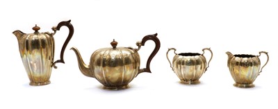 Lot 82 - A four piece composed silver tea service