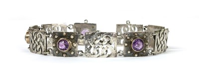 Lot 35 - An Arts & Crafts silver amethyst set bracelet by Murrle Bennett & Co., c.1910
