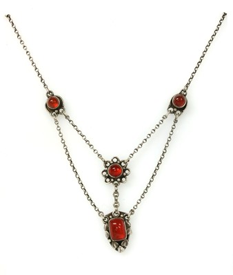 Lot 36 - A Birmingham school Arts & Crafts silver cornelian swag necklace