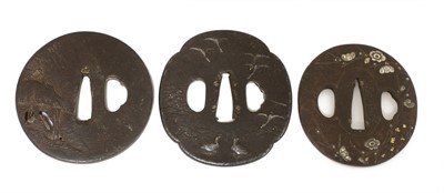 Lot 203 - Three Japanese bronze tsuba