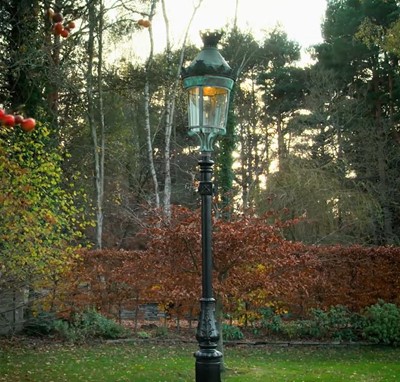 Lot 621 - A Parisian cast iron and copper street lamp