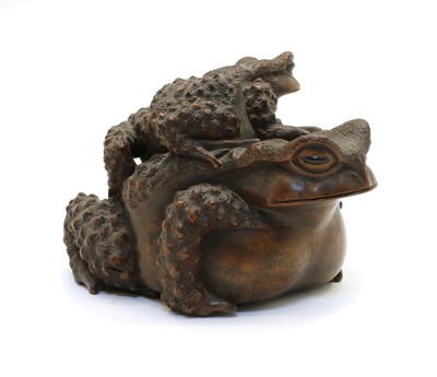Lot 239 - A Japanese wood okimono