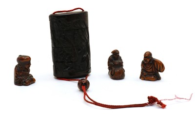 Lot 194 - Three Japanese wood netsuke