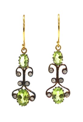 Lot 150 - A pair of silver and gold, peridot and diamond drop earrings