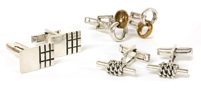 Lot 245 - Three pair of silver cufflinks