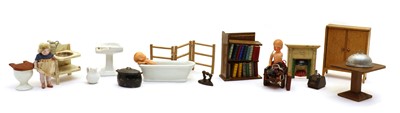 Lot 470 - A collection of dolls house furniture