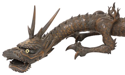 Lot 212 - A Japanese articulated wood okimono