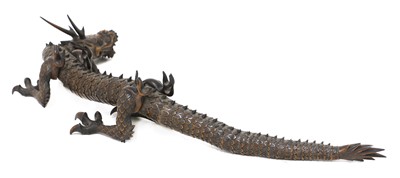 Lot 212 - A Japanese articulated wood okimono