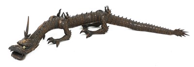 Lot 212 - A Japanese articulated wood okimono